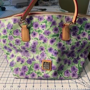 Dooney and Bourke lavender flower tote. Coated cotton, lightly used.